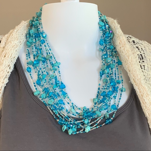 A pop of Turquoise in this beautiful, magnetic 12 strand of beads!! - Picture 1 of 4